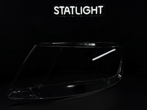 Левое стекло фары Volkswagen Touareg 2002-2007