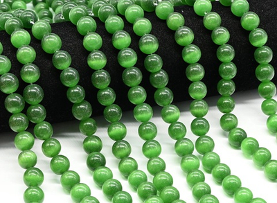 кг10-тз Кошачий глаз (имит.) 10мм, темно-зеленый, нить 19см