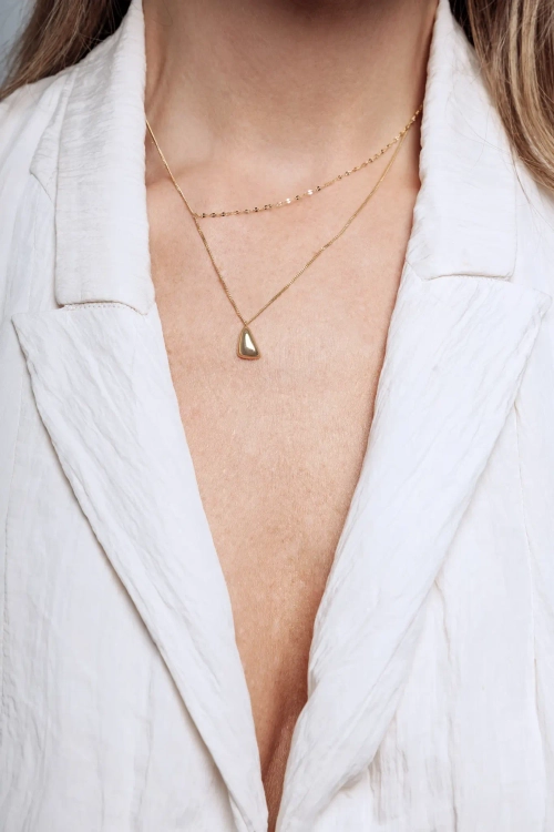 Ассиметричное колье с каплей в золочении