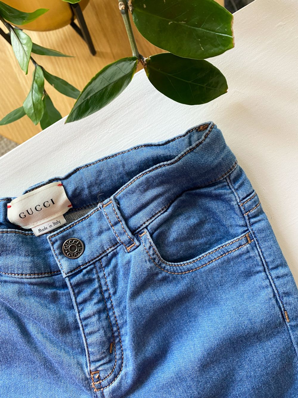 Джинсы Gucci, 92