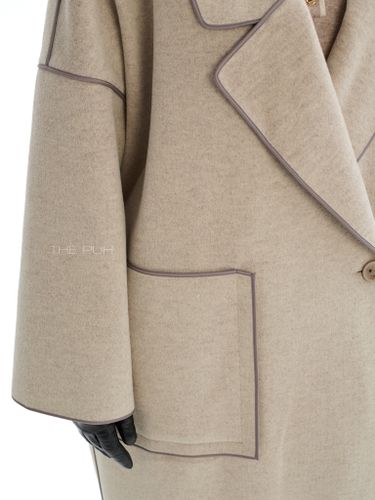 Бежевое двубортное пальто без подкладки