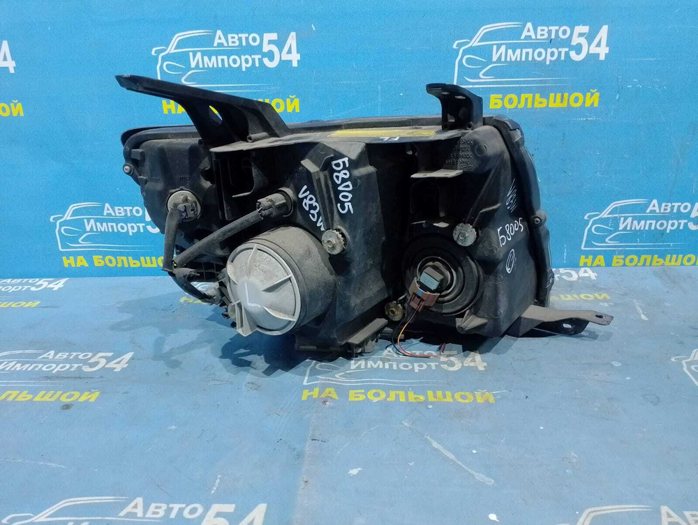 Фара передняя левая MITSUBISHI PAJERO 2006-2011