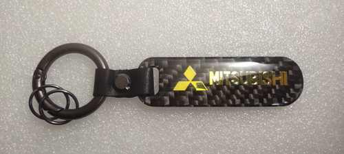 Брелок "Mitsubishi" карбон, золотой (1 шт.)