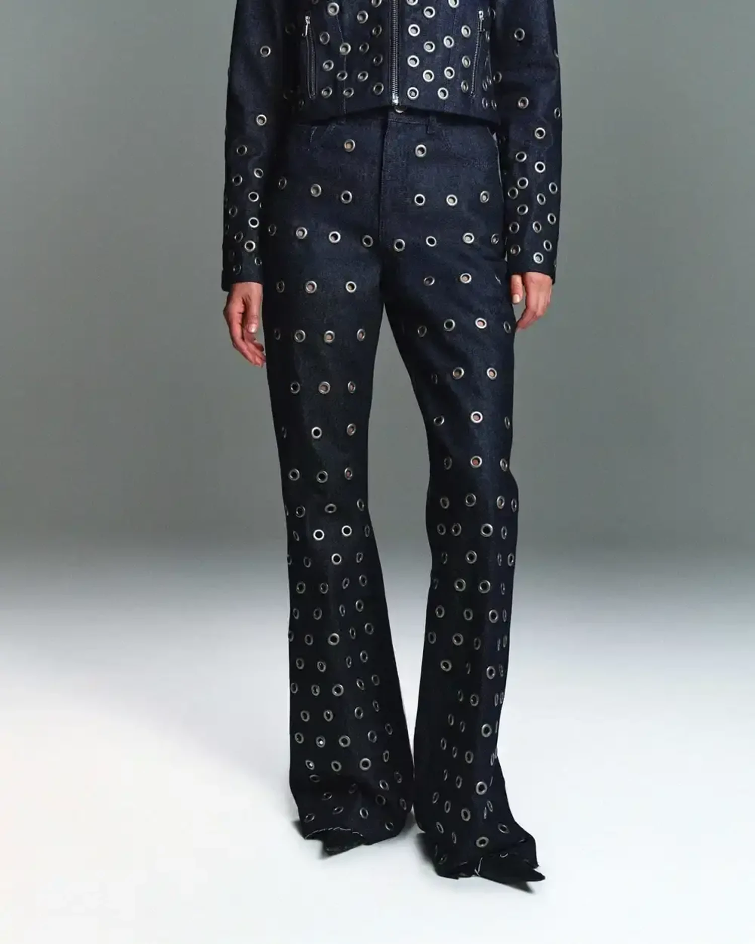 Джинсы Raw с люверсами