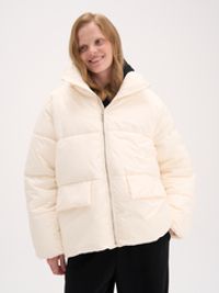 Пуховик стеганый "Молочный" женский