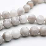 Агат "белый" бусины, диаметр около 10,4-10,6 мм, цена за 18-19 шт (1/2 нити)