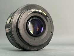 Canon 50mm 1.8 II незначительное количество пыли