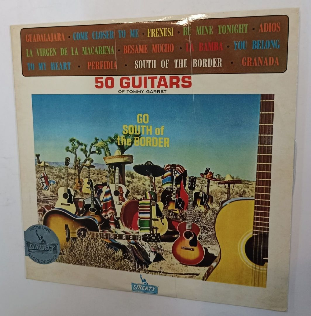 Винтажная виниловая пластинка The 50 Guitars Of Tommy Garrett 50 Guitars Go South Of The Border (Germany 1962)