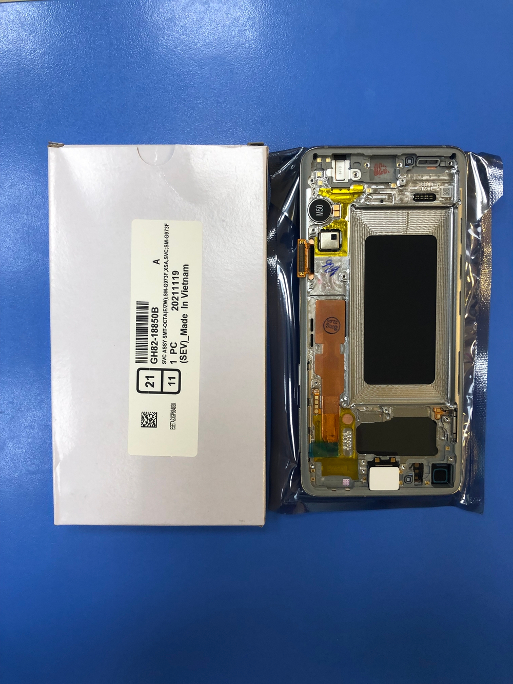 Samsung (Самсунг) G973 Galaxy S10 Дисплей в сборе с тачскрином и серебристой рамкой Оригинал Сервисный