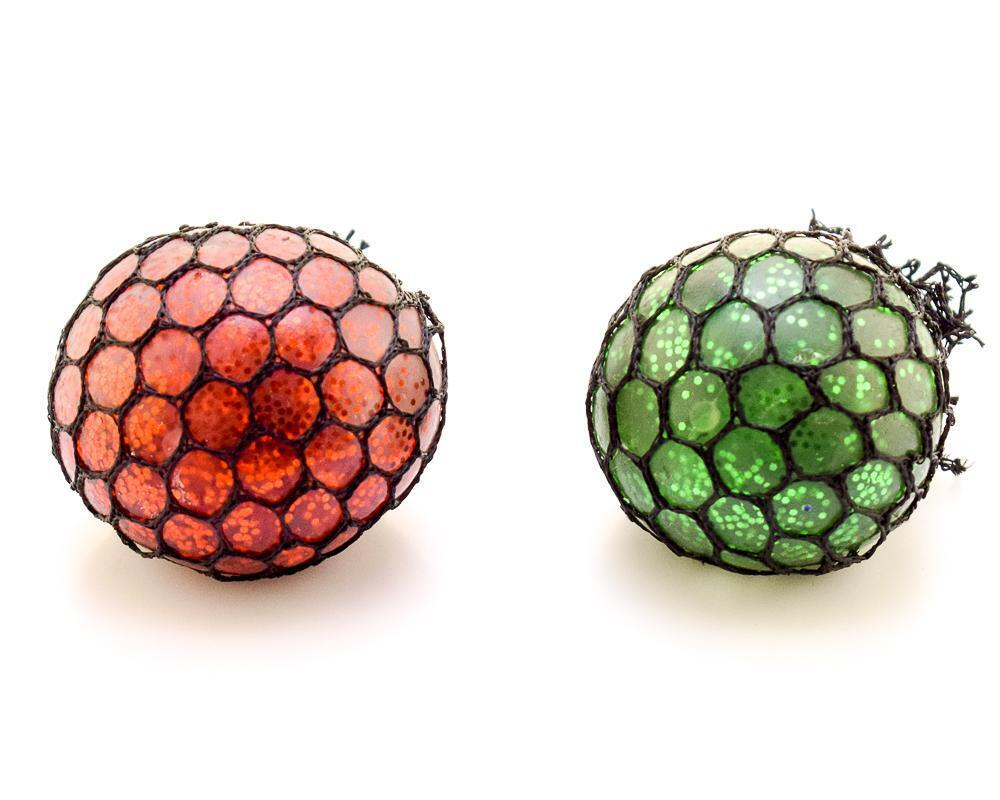 Лизун в сетке 5 см с мелкими блестками внутри 3 цвета микс пак