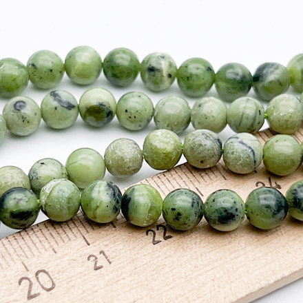 Серпентин бусины, диаметр около 6,2-6,4 мм, цена за 15-16 шт (1/4 нити)