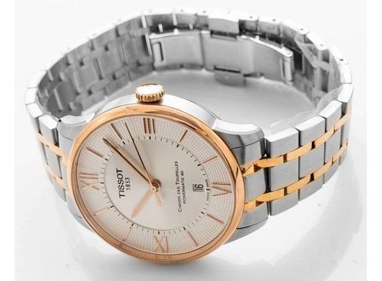 Tissot T099.407.22.038.02 мужские часы Tissot Chemin Des Tourelles Powermatic 80 on a table