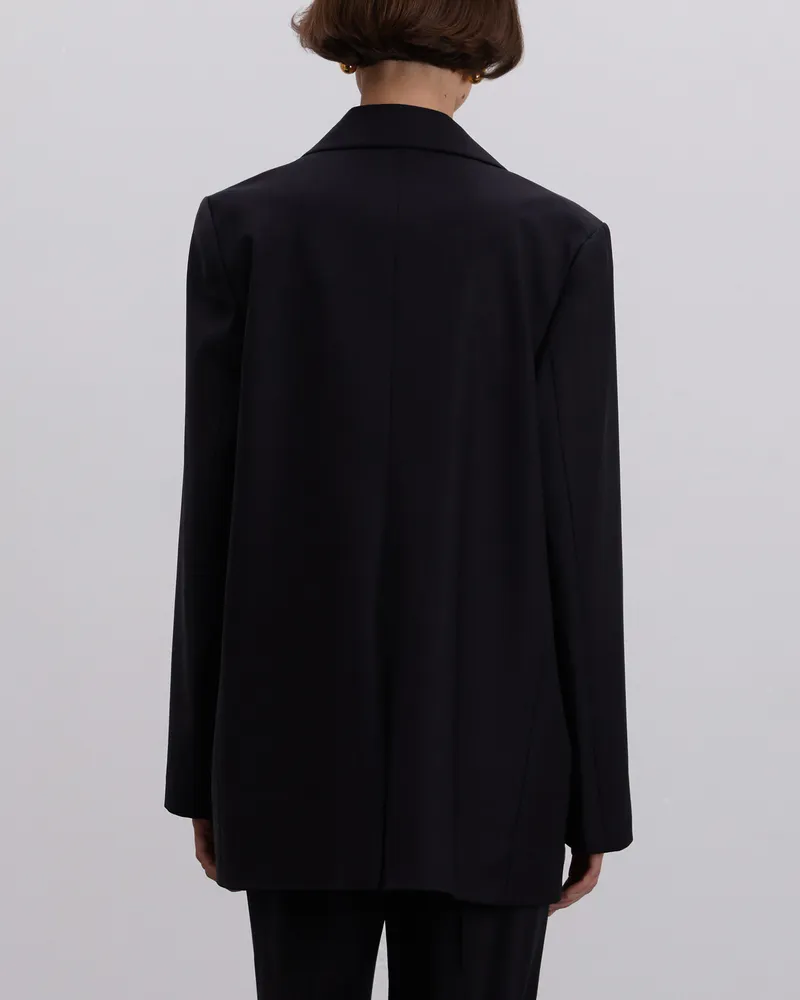 Черный шерстяной жакет с карманами