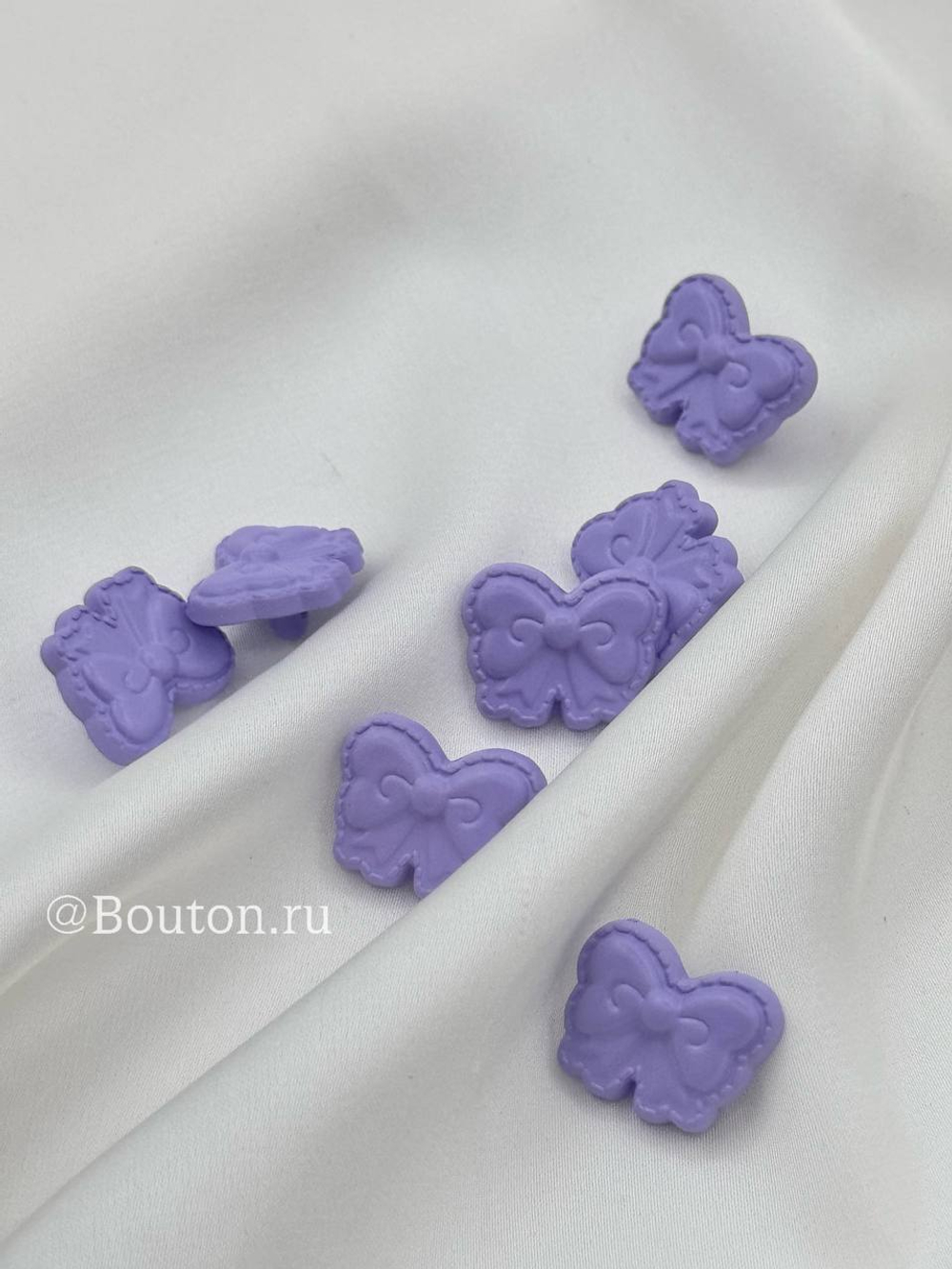 Пуговицы бантики фиолетовые пластиковые