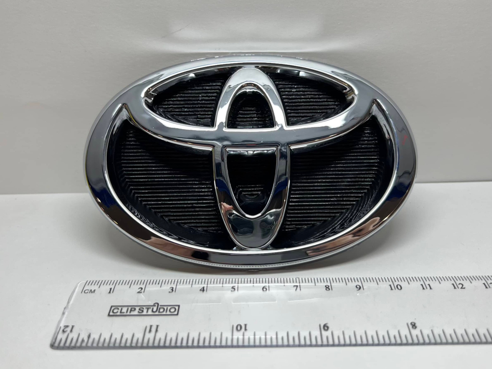 Логотип (шильдик, надпись, эмблема) "Toyota" 11см для крышки багажника / решетки радиатора / капота