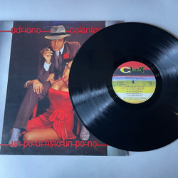Винтажная виниловая пластинка LP Adriano Celentano, Un Po Artista Un Po No (Италия 1980) Il Tempo Se Ne Va