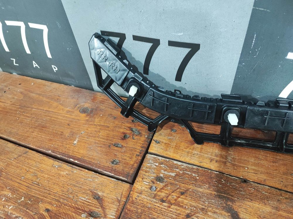 Кронштейн бампера задний правый Kia Rio 3 новый 866144Y500