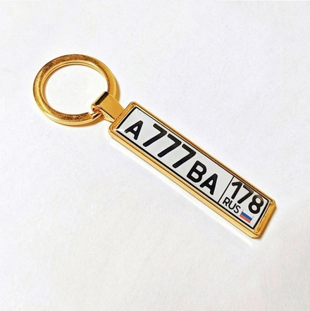 Брелок металлический с линзой