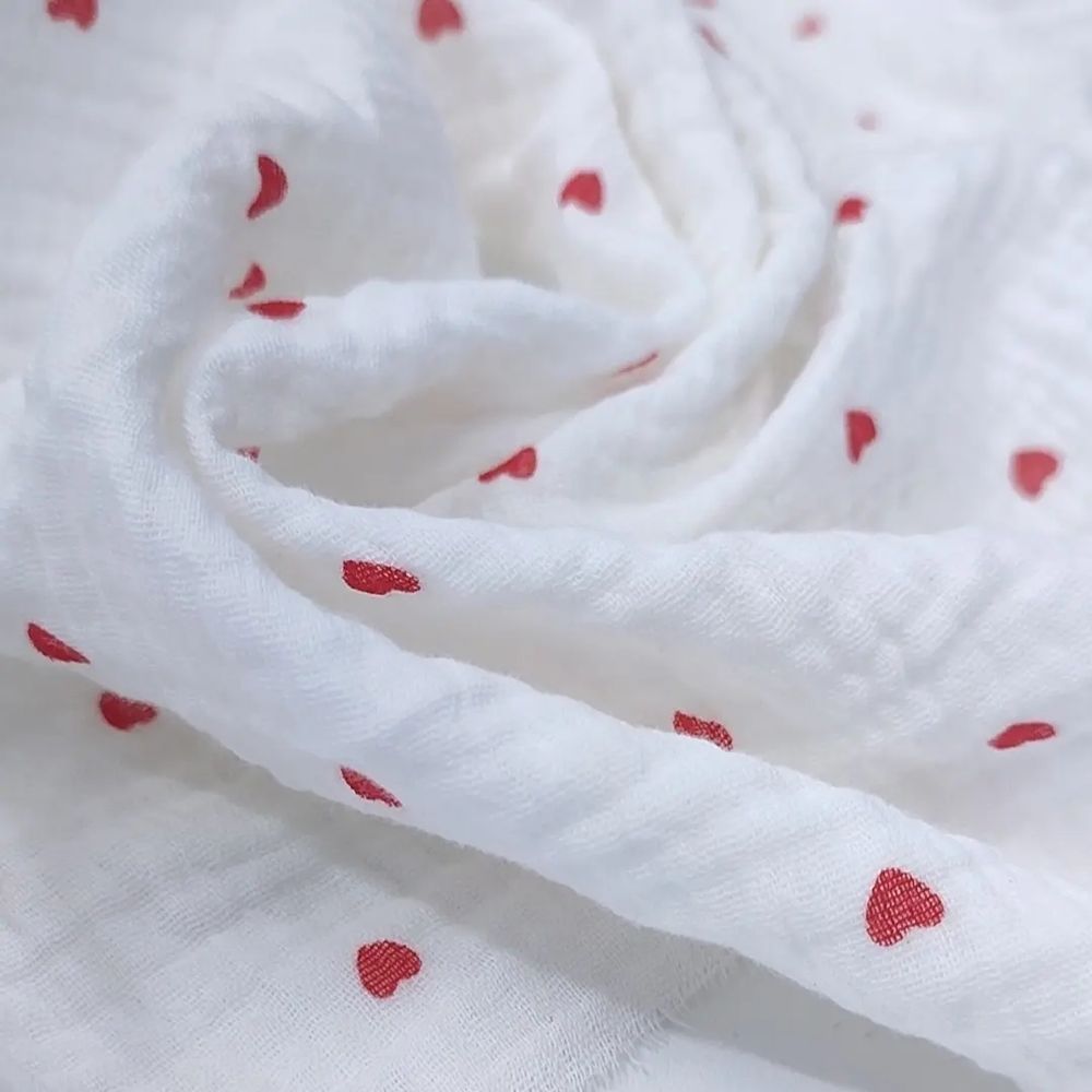 Муслин двухслойный "Мелкие сердца на молочном"