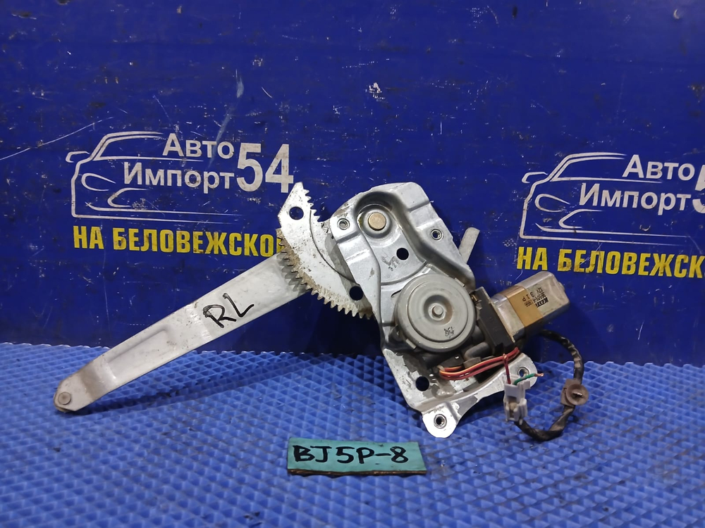 Стеклоподъемник задний левый MAZDA FAMILIA 2003