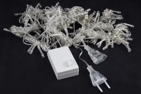 Занавес с контроллером 1.5*1 м., 220V, 100 теплых белых LED ламп, соединяемый, прозрачный провод, Winner (ww.03.5Т.100+)