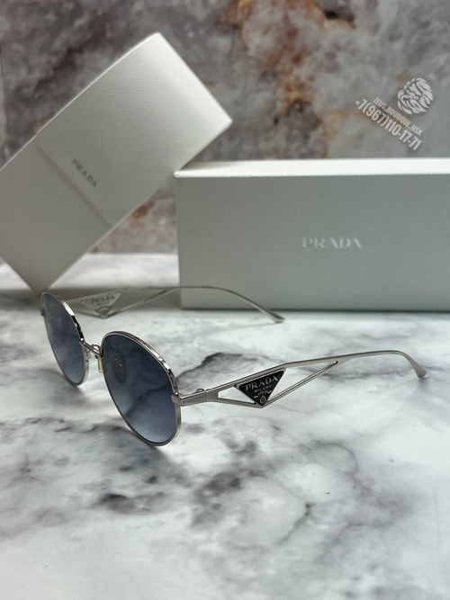 Солнечные очки Prada