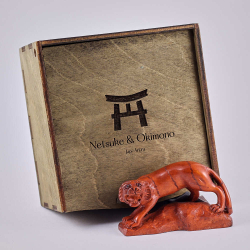 Нэцкэ Тигр на камне