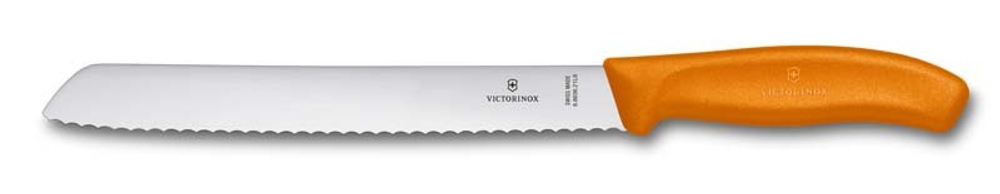 Фото нож для хлеба VICTORINOX SwissClassic лезвие из нержавеющей стали 21 см с волнистой кромкой оранжевая пластиковая рукоять в картонном блистере с гарантией