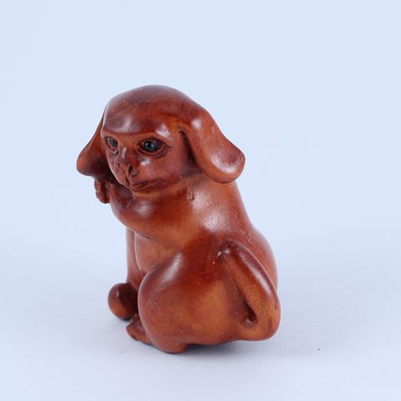 Нэцкэ Собачка с игрушкой