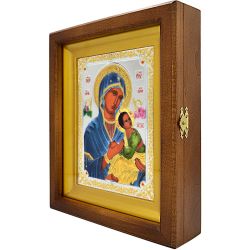 Икона Страстная Божией Матери в серебряном окладе, в деревянном киоте.