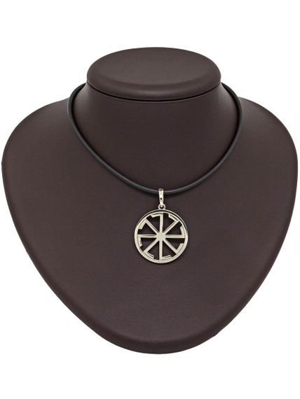 Фото подвески оберег Ладинец на постаменте.