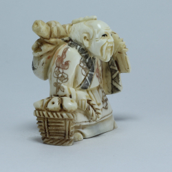 Эксклюзивная нэцкэ Монах с кузовком и корзиной рыбы