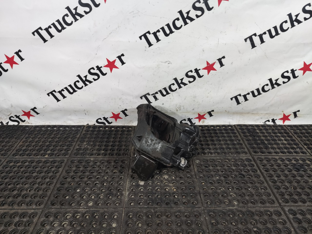 Суппорт задний левый