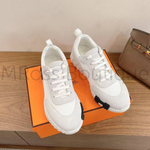 Мужские кроссовки Hermes Bouncing белого цвета с буквой на подошве