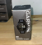 Часы Garmin Forerunner 165 Music черный с серым ремешком, 010-02863-30. Товар уцененный