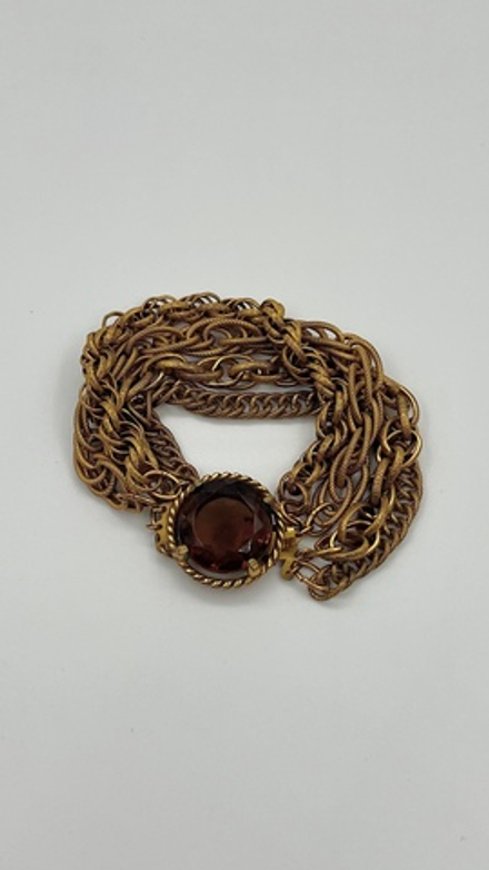 Браслет с коричневым кристаллом