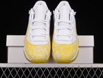 Jordan 11 Retro Low Tour Yellow Snakeskin