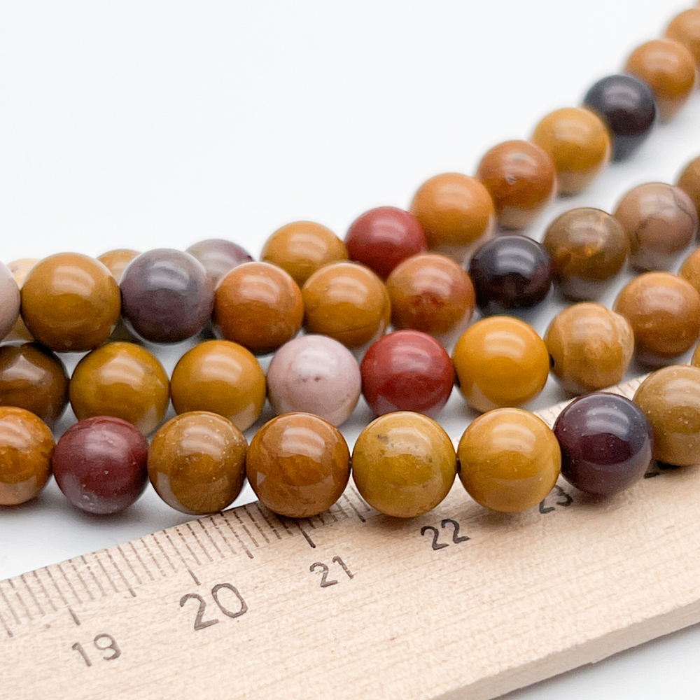 Мукаит бусины, диаметр 8-8,3 мм, цена за 22-23 шт (1/2 нити)