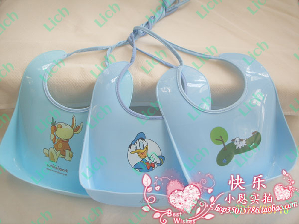 Слюнявчик водонепроницаемый силиконовый с рисунками зверей