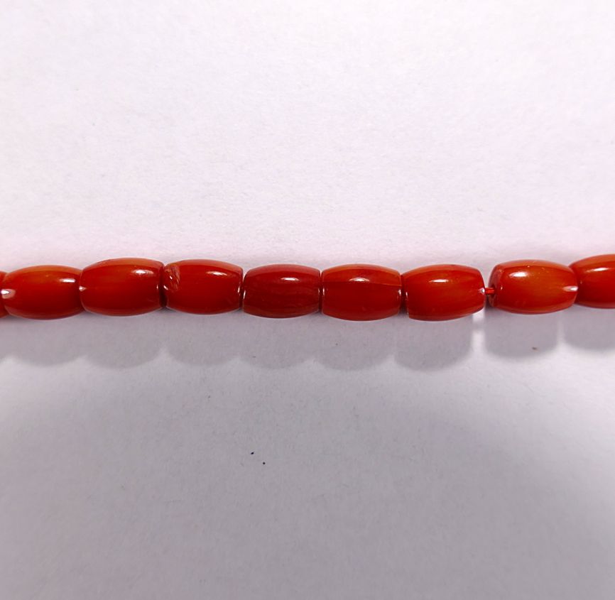 Бусина из коралла оранжевого, облагороженного, фигурная, 5x7 мм (овал-бочонок, гладкая)