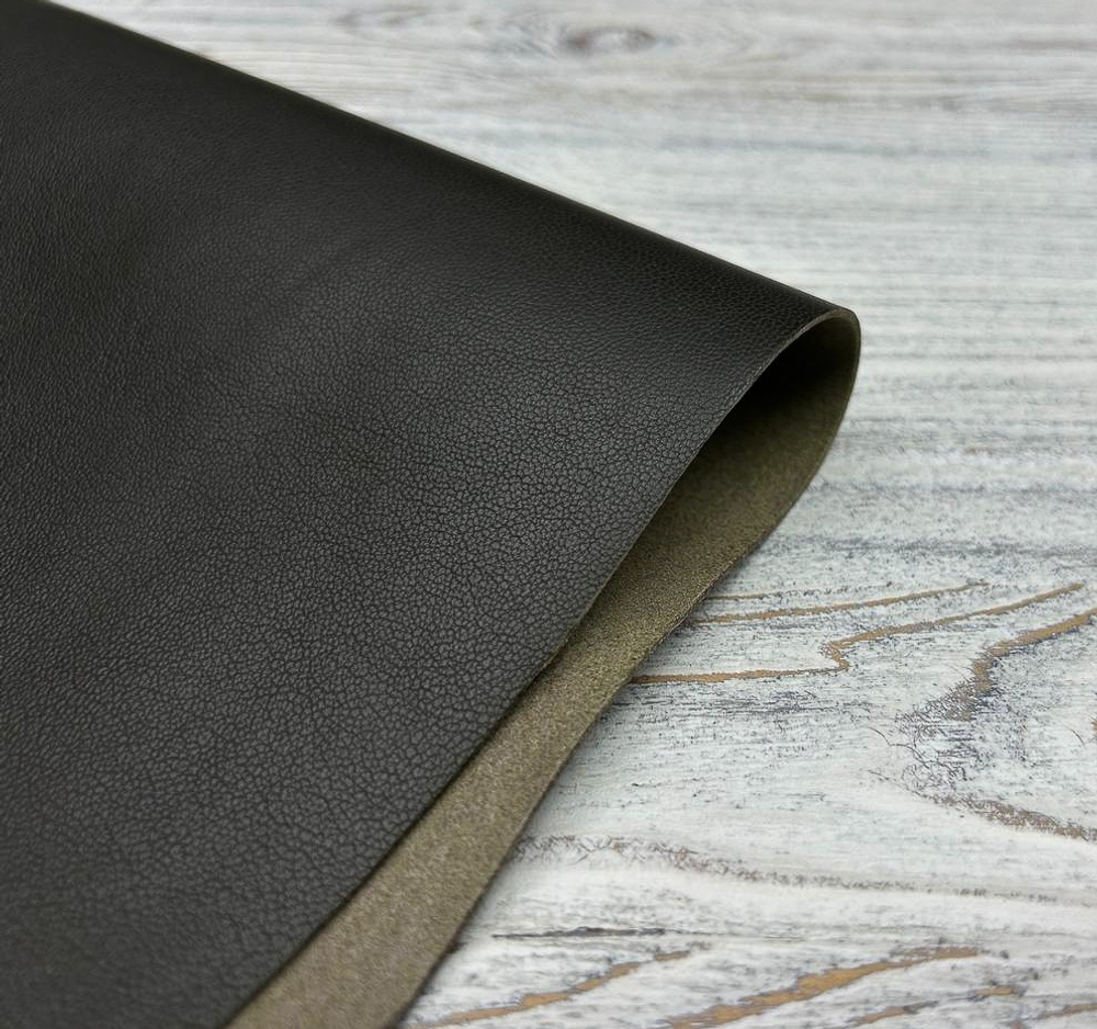 фактура натуральной кожи темно-зеленого цвета