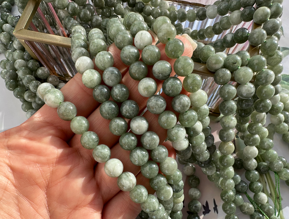 Нить бусин из тонированного кварца 8мм, гладкие