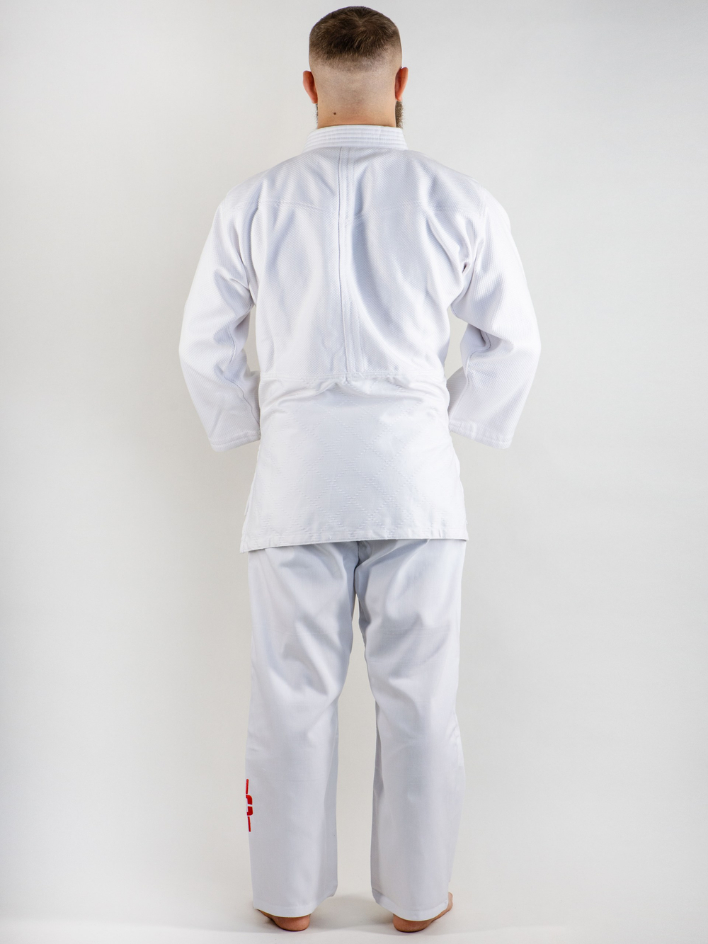 C555 Кимоно для дзюдо подростковое Clinch Judo Red FDR белое