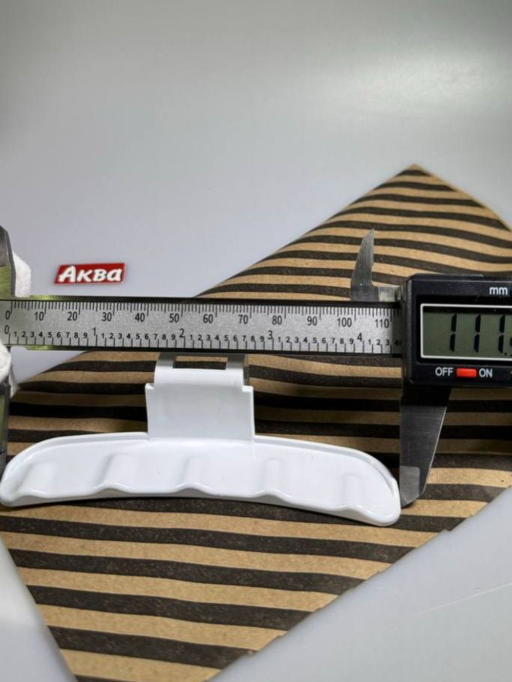 Ручка люка стиральной для машины Samsung белая DC64-02852A