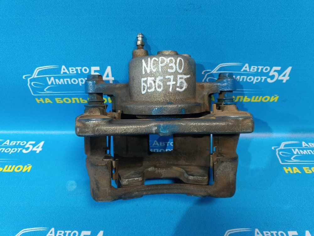 Суппорт тормозной передний левый TOYOTA FUNCARGO 1999-2005