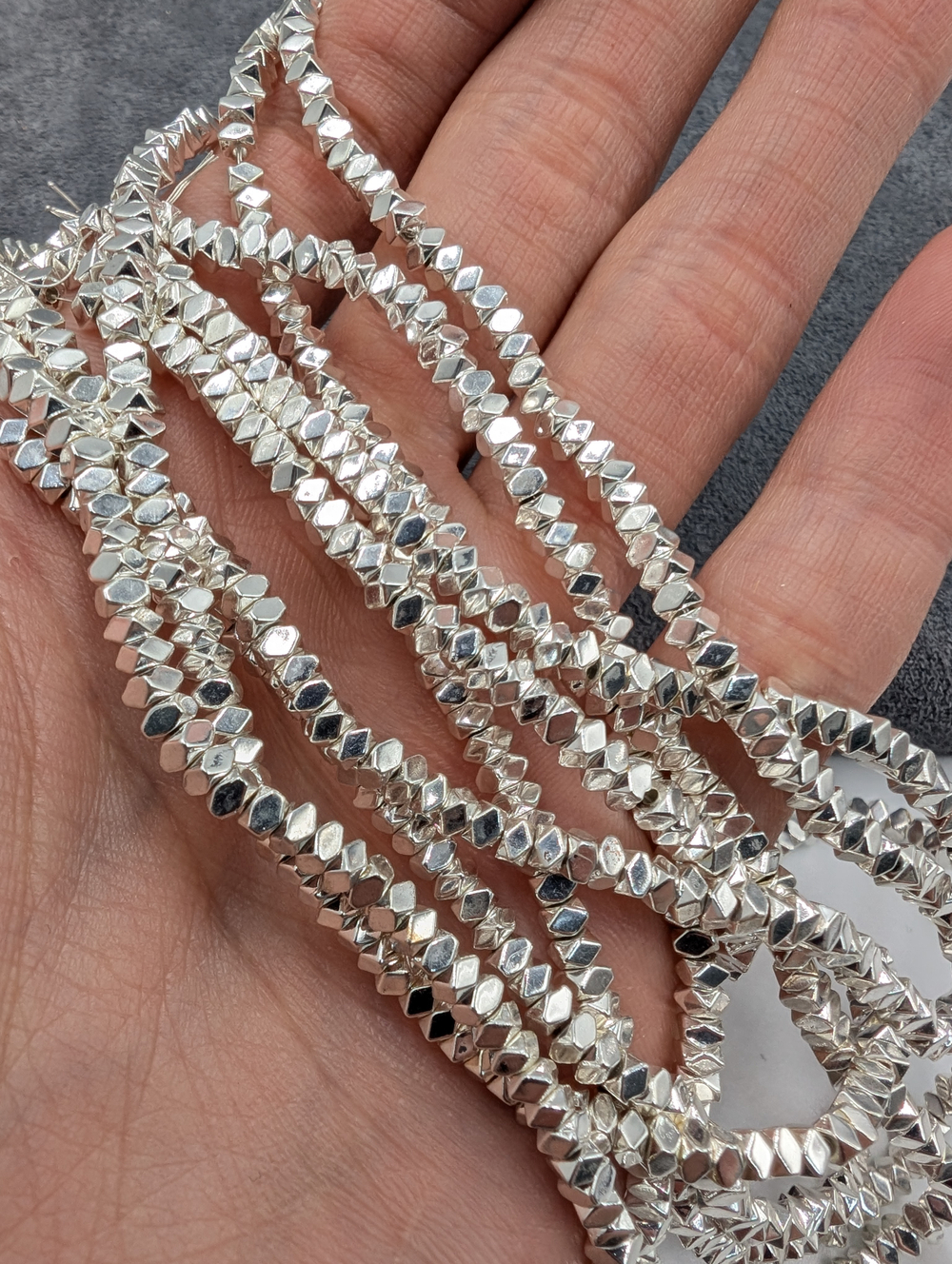 Гематит ромбики 3*2, светлое серебро