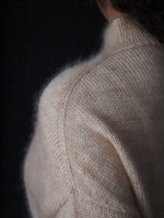 Описание по вязанию свитера спицами "Sefkat"