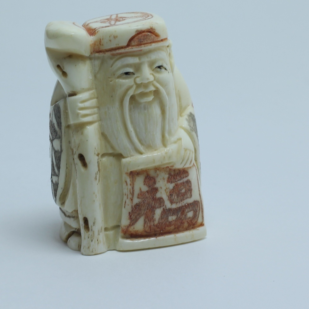 Нэцкэ Дзюродзин с чудо посохом и иероглифом счастье