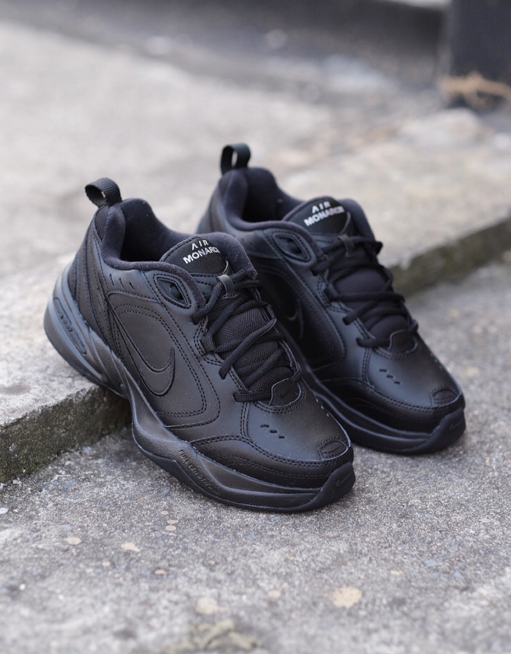Nike air monarch iv triple black on sale