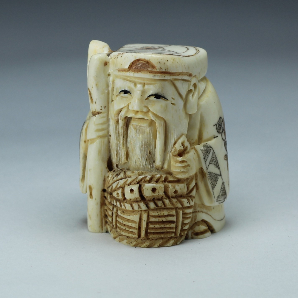 Нэцкэ Дзюродзин с посохом и корзиной рыбы